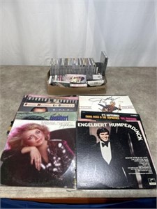 Assortment of records, cassettes, and CDs