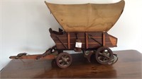 Vintage covered wagon TV lamp. Fabric has water