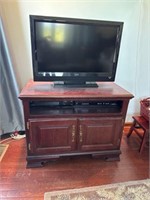 Vizio TV, TVstand and VHS player