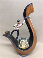 Whiskey decanter man on boat