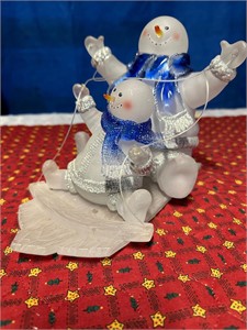 Glass Snowmen sled figurine