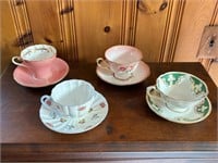 Four Bone China Cups and Saucers