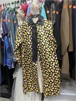 Flower rain coat, size small. Comes with little