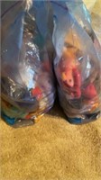 2 storage bags stuffed with new beanie babies