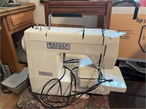 DELUXE SEWING MACHINE