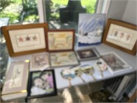LARGE LOT OF PICTURES ON TABLE TOP