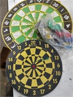 2  dart boards with darts