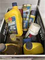 Box of opened Marine gear lube, opened marine