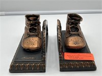 Bronzed baby shoe bookends.