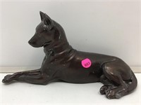Cast metal dog statue. 10x6x4