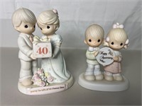 Two Anniversary Precious Moments Figurines