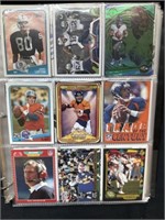 Binder of NFL Cards with a page of Hockey and