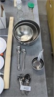 Metal mixing bowls, measuring cups, and m