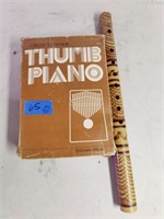 Oscar Schmidt thumb piano and flute.