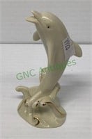 Lenox dolphin figurine measuring 4 inches tall.