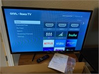 New in box 32" Roku TV with remote