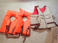 Adult Life Vest + (2) Life Jackets