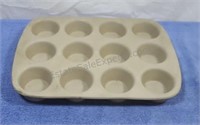 Pampered Chef clay muffin pan.