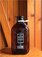 Gates Farms Amber Milk Bottle, 1/2 Gal., 1960's