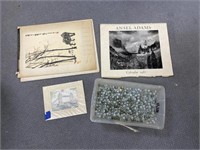 Container of Decorative Stones & Old Calendars