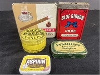 Assortment of vintage product tins. Includes