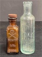 Vintage mini medicine bottles. The brown on is