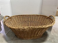 Vintage wicker clothes basket
