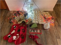 Tote of Christmas ornaments, lights, ribbon +
