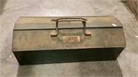 Large green metal toolbox contains a tray with