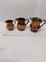 3 vintage copper luster pitchers