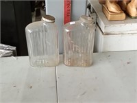 2 glass refrigerator bottles - 1 missing lid