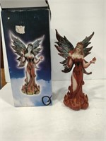 Carved and painted fairy 8 in tall