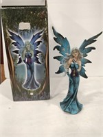 Carved and painted fairy 8 in tall