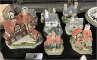 Collection Of Enesco David Winter Cottages.