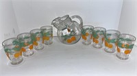 Orange glass pitcher w/ (8) orange glasses