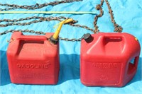 two five gallon gas cans