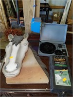 Electric fence charger, wooden horse piece, hole