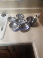 Metal serving dishes and triple tray.