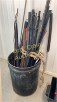 5 gallon bucket, springs, rebar, anchor, tongs,