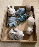 Small garden creatures features two bunnies that