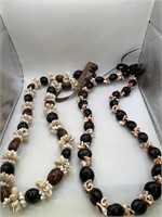 PAIR OF ISLANDER SHELL NECKLACES