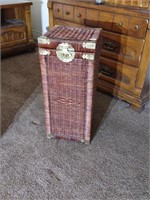 Wicker clothes hamper. Missing a handle.