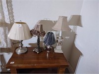 Lot of 4 small table lamps. Various sizes. One is
