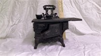 Rescent Cast Iron Stove  with assorted  pieces