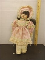 Vintage porcelain doll 13 inches tall