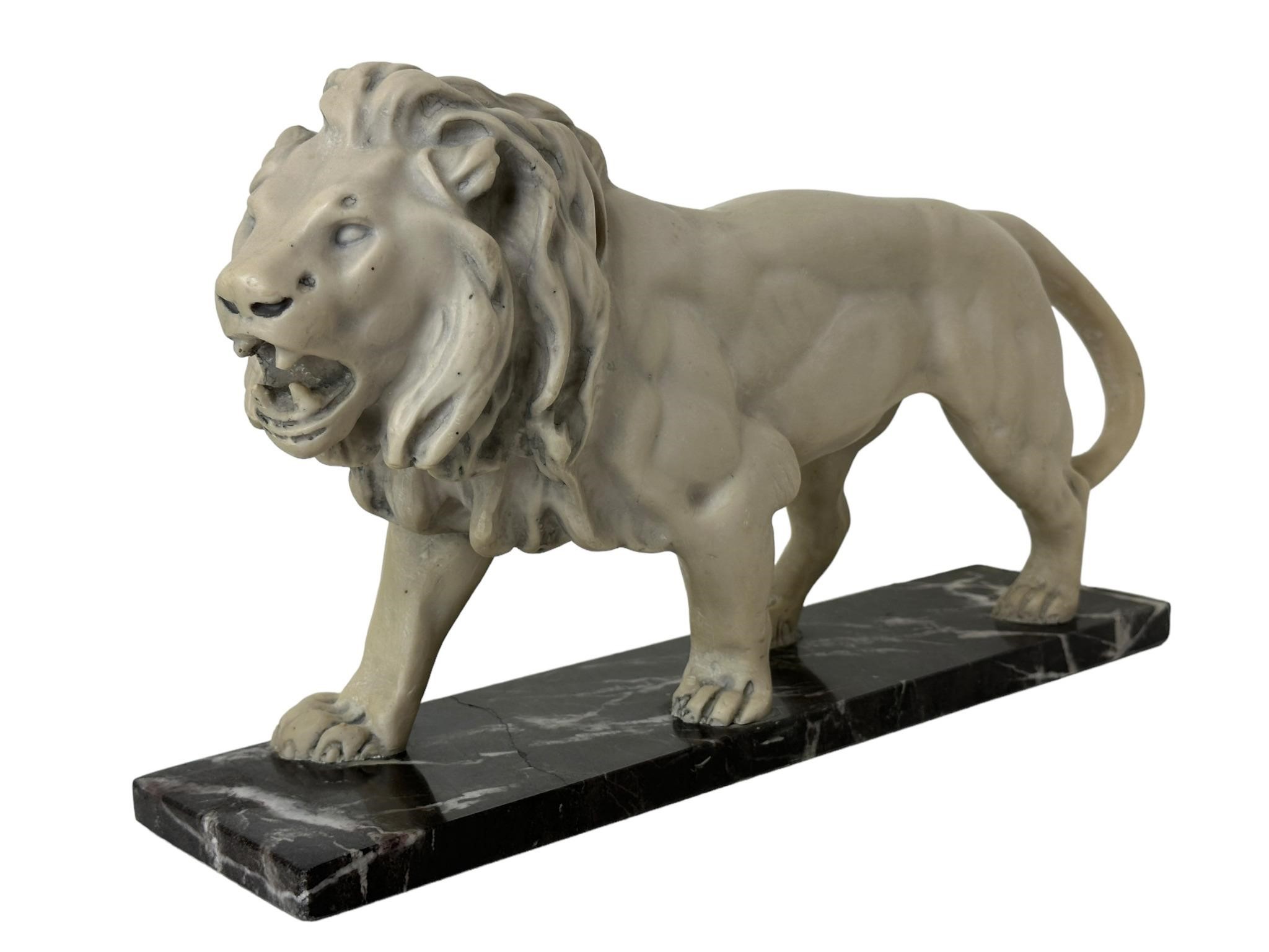 Lion Sculpture on Marble Base