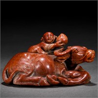 A Chinese Carved Soapstone Buffalo with Kid