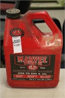 PARTIAL BOTTLE OF MARVEL MISTERY OIL