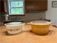 Two Pyrex covered casseroles