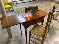 Singer sewing machine/ chair